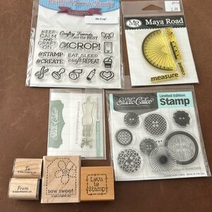 Crafting themed stamps… 4 packages with multiple clear stamps plus 4 wooden